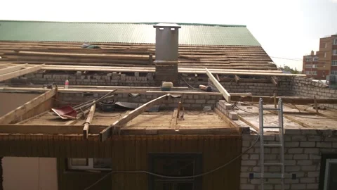 Slow motion planks during demolition of a house. 動画素材 241066322