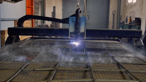 Slow motion of plasma cutter. Plasma robotic industrial equipment works with Stock Footage 94541680