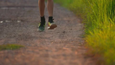 Slow motion pleple running on sunset in rarul Stock-Footage 219378172