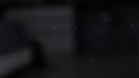 Slow motion of PM 2.5 and other dust in dark bedroom Stock Footage 102186883