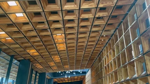 Slow motion point of view footage looking up at a geometric wooden. Stock Footage 320502787