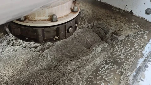 Slow motion of polystyrene concrete mixing with rotating auger Stock Footage 340276424