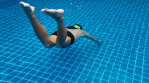Slow motion pool dive. Stock Footage 65563632