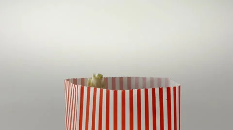 Slow Motion Popcorn Falling Inside Vintage Bag Stock-Footage 54294586