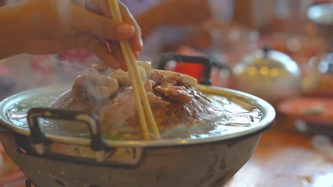 Slow motion pork meat grilled on pan for eating food of people in restaurant  库存影片 113967202