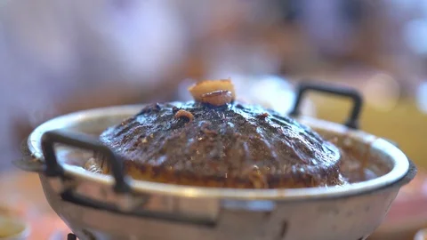 Slow motion pork meat grilled on pan for eating food of people in restaurant  库存影片 113969856