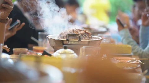 Slow motion pork meat grilled on pan for eating food of people in restaurant  Видео 113970252