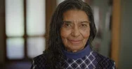Slow Motion Portrait Of Elderly Indian Woman Smiling Enjoying Calm Peaceful Stock Footage