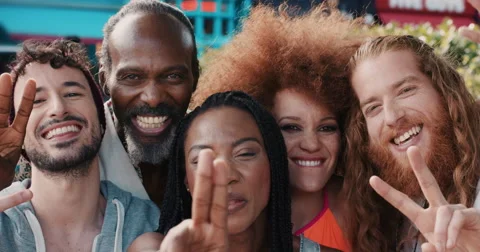 Slow Motion Portrait of multi ethnic group of people smiling peace sign 스톡 동영상 56855520