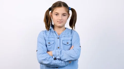 Slow motion portrait og young adorable teenage girl smiling at the camera Stock Footage 84600825