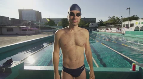 Slow Motion Portrait Shot Of Swimmer Standing By The Swimming Pool Stock Footage 34159707