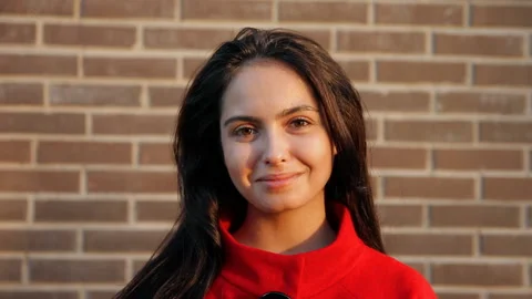 Slow motion portrait of a young charming happy woman. Stock Footage 94542989
