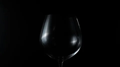 Slow motion pour red wine on black background Stock Footage 115113388