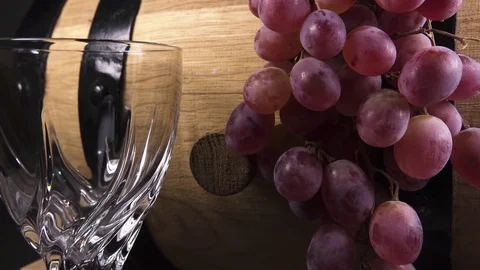 Slow motion pour wine into a crystal glass close up Video stock 97278651