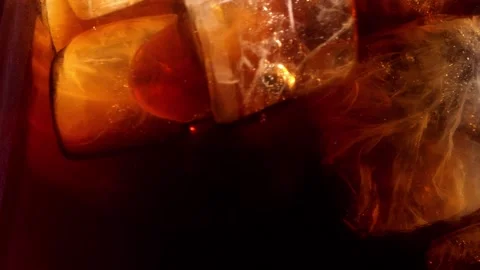 Slow Motion Of Pouring Drink With Ice Cubes Inside, Close-up 300 fps Stock Footage 151622862