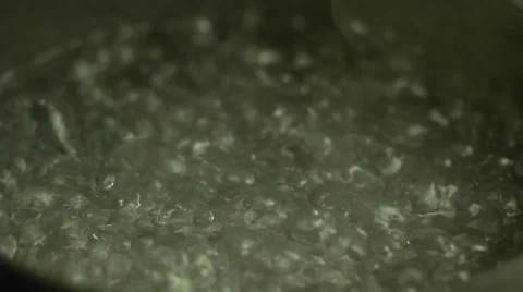 Slow Motion Pouring Macaroni into Boiling Pot. Stock-Footage 58014778