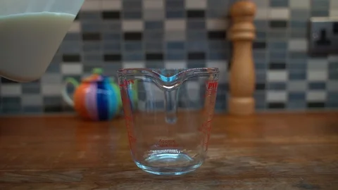 Slow Motion Pouring Milk Stock Footage 92844526