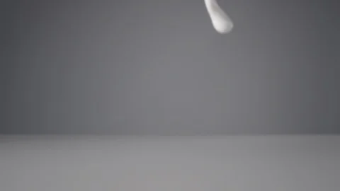 Slow motion of pouring milk stream, macro shot. Stock Footage 127267557