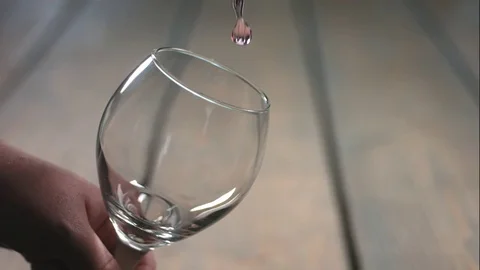 Slow Motion Pouring Rose Into Wine Glass Stock Footage 70333312