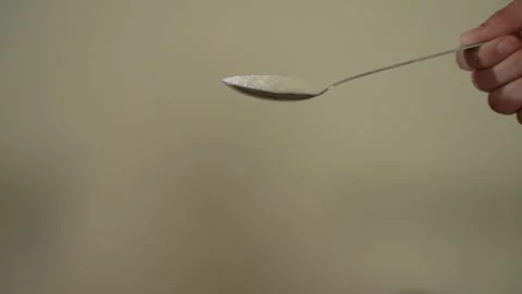Slow motion of pouring salt 1 Stock Footage 292965402