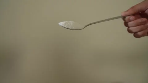 Slow motion of pouring salt 2 Stock Footage 292965543