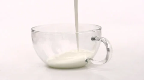Slow motion pouring yoghurt Stock Footage 33802589