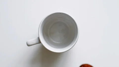 Slow motion pours instant coffee Stock-Footage 104556986