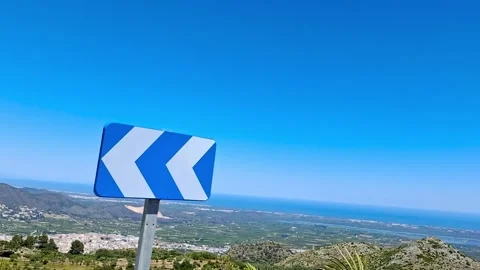 Slow motion POV driving shot descending from the scenic Puerto de Vall de Eb Stock Footage 339748103