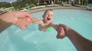 Slow Motion Pov: Father Spinning Happy Little Boy In Sunny Summer Stock Footage