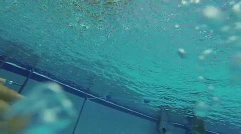 Slow motion POV jumping into a pool 스톡 동영상 40491773