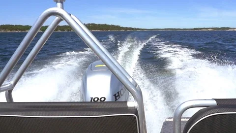 Slow motion pov view backwards of a boat driving on the sea, in saaristomeri  Stock Footage 94250640