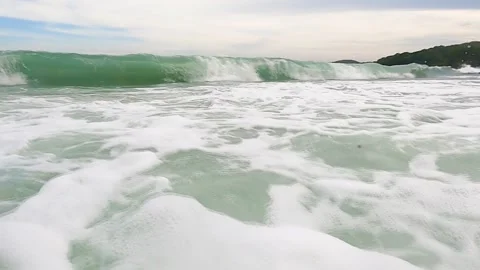 Slow motion Powerful wave rolling and splash on the seashore Stock Footage 198819168