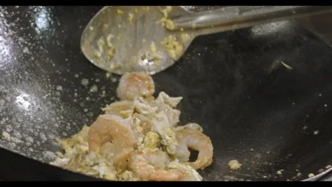 Slow-Motion Preparation of Gourmet Peruvian Shrimp Fried Rice Stock Footage 291313953