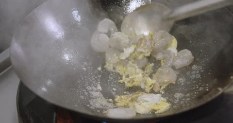 Slow-Motion Preparation of Gourmet Peruvian Shrimp Fried Rice Stock Footage 291313968