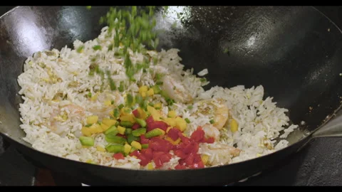 Slow-Motion Preparation of Gourmet Peruvian Shrimp Fried Rice Stock Footage 291313975