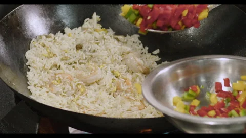 Slow-Motion Preparation of Gourmet Peruvian Shrimp Fried Rice Stock Footage 291313983