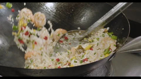 Slow-Motion Preparation of Gourmet Peruvian Shrimp Fried Rice Stock Footage 291314026
