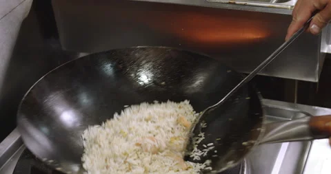 Slow-Motion Preparation of Gourmet Peruvian Shrimp Fried Rice Stock Footage 291314052