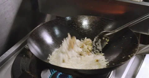 Slow-Motion Preparation of Gourmet Peruvian Shrimp Fried Rice Stock Footage 291314053