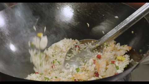 Slow-Motion Preparation of Gourmet Peruvian Shrimp Fried Rice Stock Footage 291314067