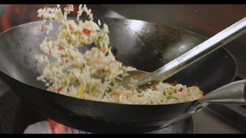 Slow-Motion Preparation of Gourmet Peruvian Shrimp Fried Rice Stock Footage 291314076