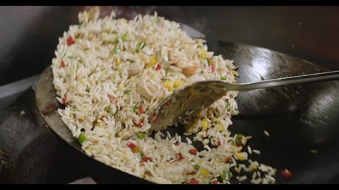 Slow-Motion Preparation of Gourmet Peruvian Shrimp Fried Rice Stock Footage 291314128