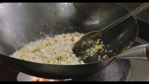 Slow-Motion Preparation of Gourmet Peruvian Shrimp Fried Rice Video stock 291314142