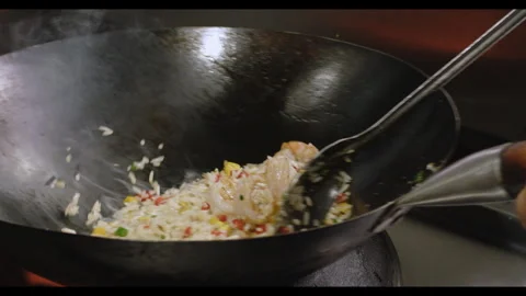 Slow-Motion Preparation of Gourmet Peruvian Shrimp Fried Rice Stock Footage 291314146
