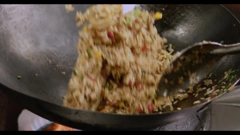 Slow-Motion Preparation of Gourmet Peruvian Shrimp Fried Rice Video stock 291314195