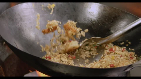 Slow-Motion Preparation of Gourmet Peruvian Shrimp Fried Rice Stock Footage 291314206