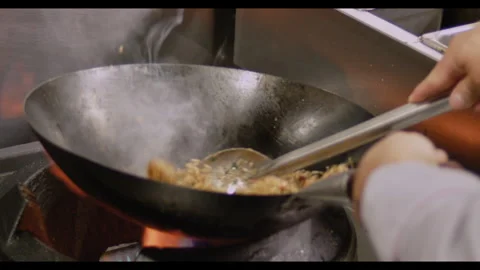 Slow-Motion Preparation of Gourmet Peruvian Shrimp Fried Rice Stock Footage 291314239