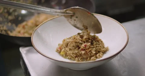 Slow-Motion Preparation of Gourmet Peruvian Shrimp Fried Rice Stock Footage 291314479