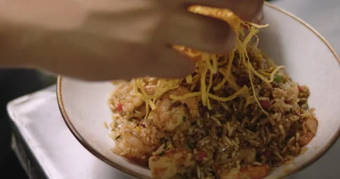 Slow-Motion Preparation of Gourmet Peruvian Shrimp Fried Rice Stock Footage 291314612