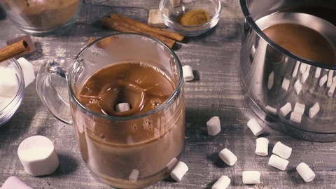 Slow motion preparation of hot cocoa drink Stock Footage 95317342